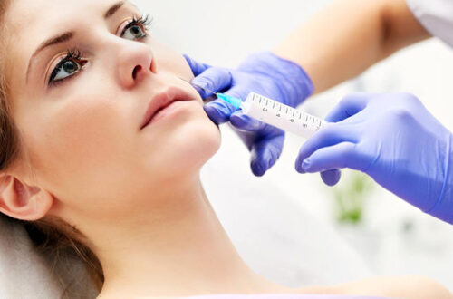 Woman receiving dermal filler treatment at a private dentist in Ealing to restore facial volume and reduce wrinkles